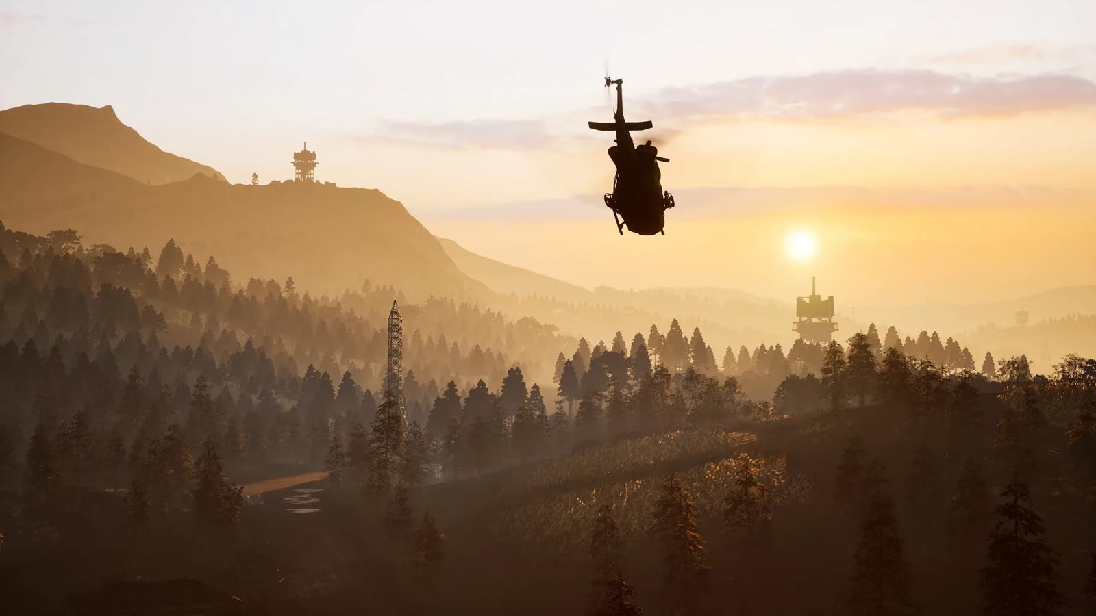 A helicopter over the mountains at sunset in Wardogs
